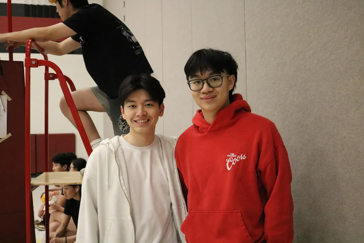 Nathan and a fellow Bounce organizer smiling together courtside at the tournament